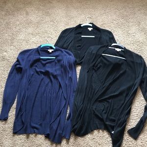 3 cardigans , two black , one navy